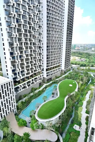Stunning high-rise building with lush garden and pool view