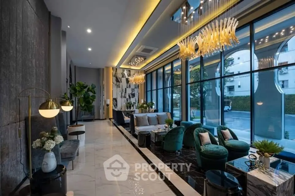 Luxurious modern living room with elegant lighting and floor-to-ceiling windows.
