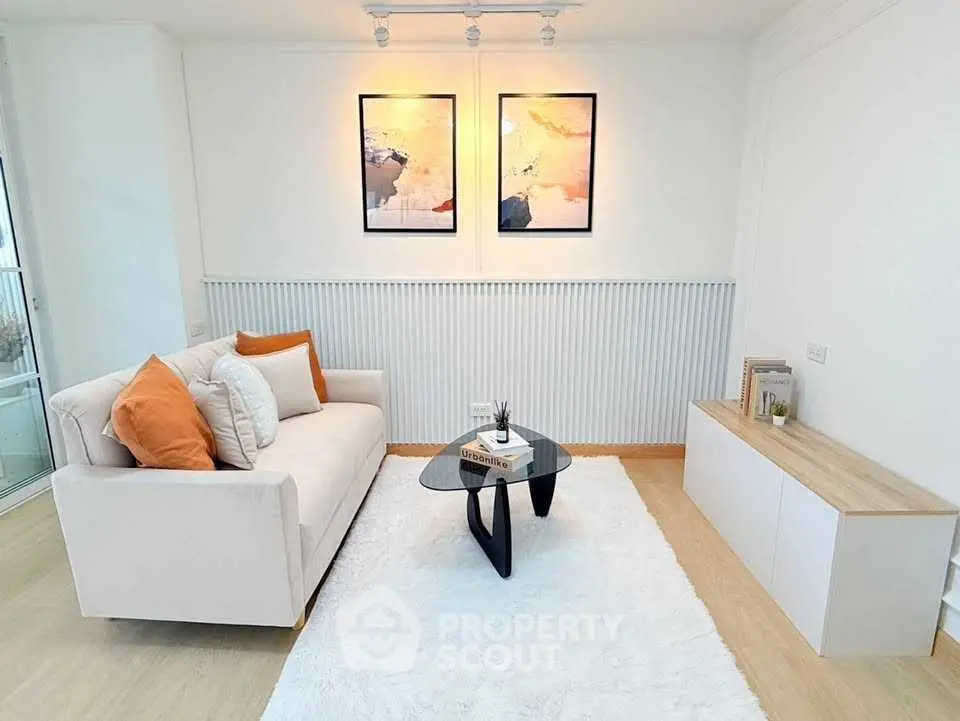 Stylish modern living room with cozy sofa and elegant decor