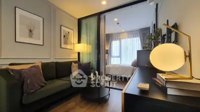 Modern living room with cozy sofa and stylish decor leading to a bright bedroom