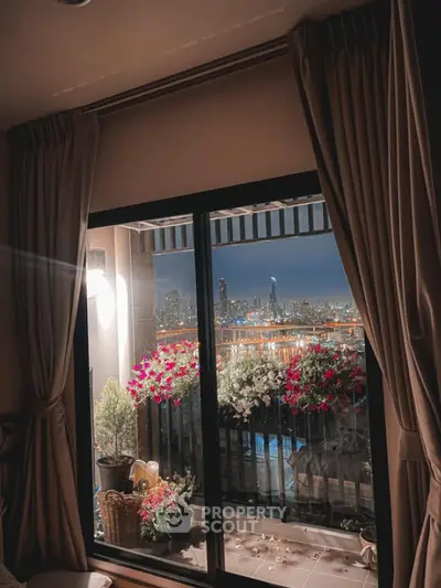Charming balcony with city skyline view and vibrant flowers, perfect urban retreat.