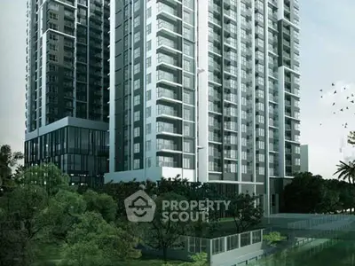 Modern high-rise residential building with lush green surroundings and sleek architectural design.