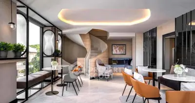 Modern living room with stylish furniture and elegant lighting in a contemporary apartment.