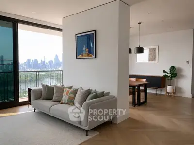Spacious modern living room with city view and elegant decor