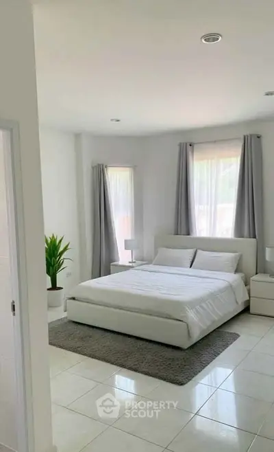 Bright and airy bedroom with modern decor and natural light