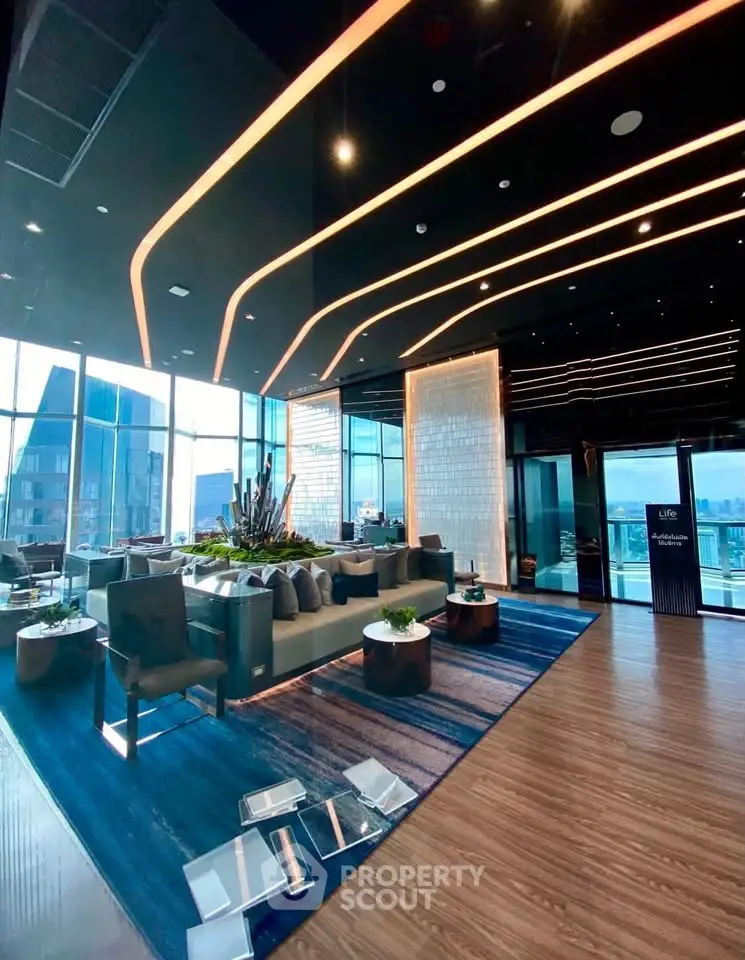 Luxurious modern living room with panoramic city views and elegant interior design.