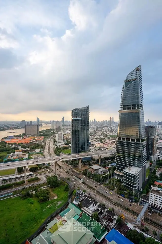 Stunning cityscape view with modern skyscrapers and lush greenery, perfect for urban living enthusiasts.