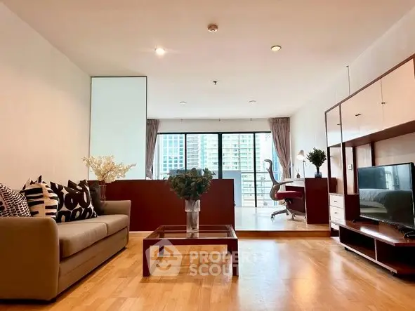 Spacious modern living room with city view, stylish furniture, and natural light.