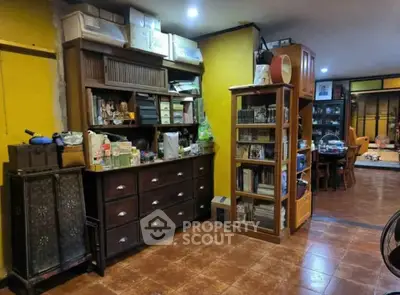 Charming interior with vintage furniture and warm lighting, perfect for cozy living spaces.