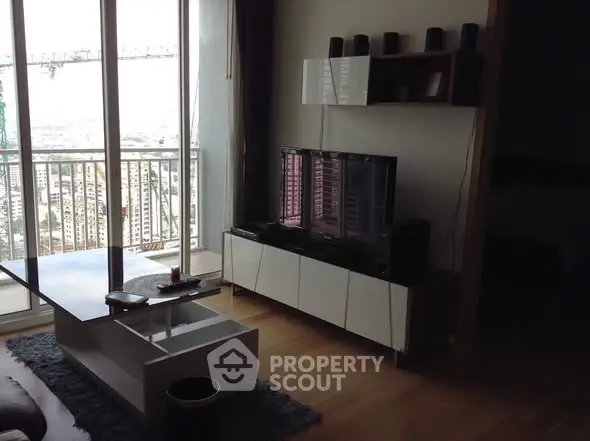 Modern living room with balcony view and stylish furniture