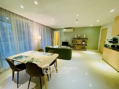 Spacious modern living room with elegant dining area and stylish decor