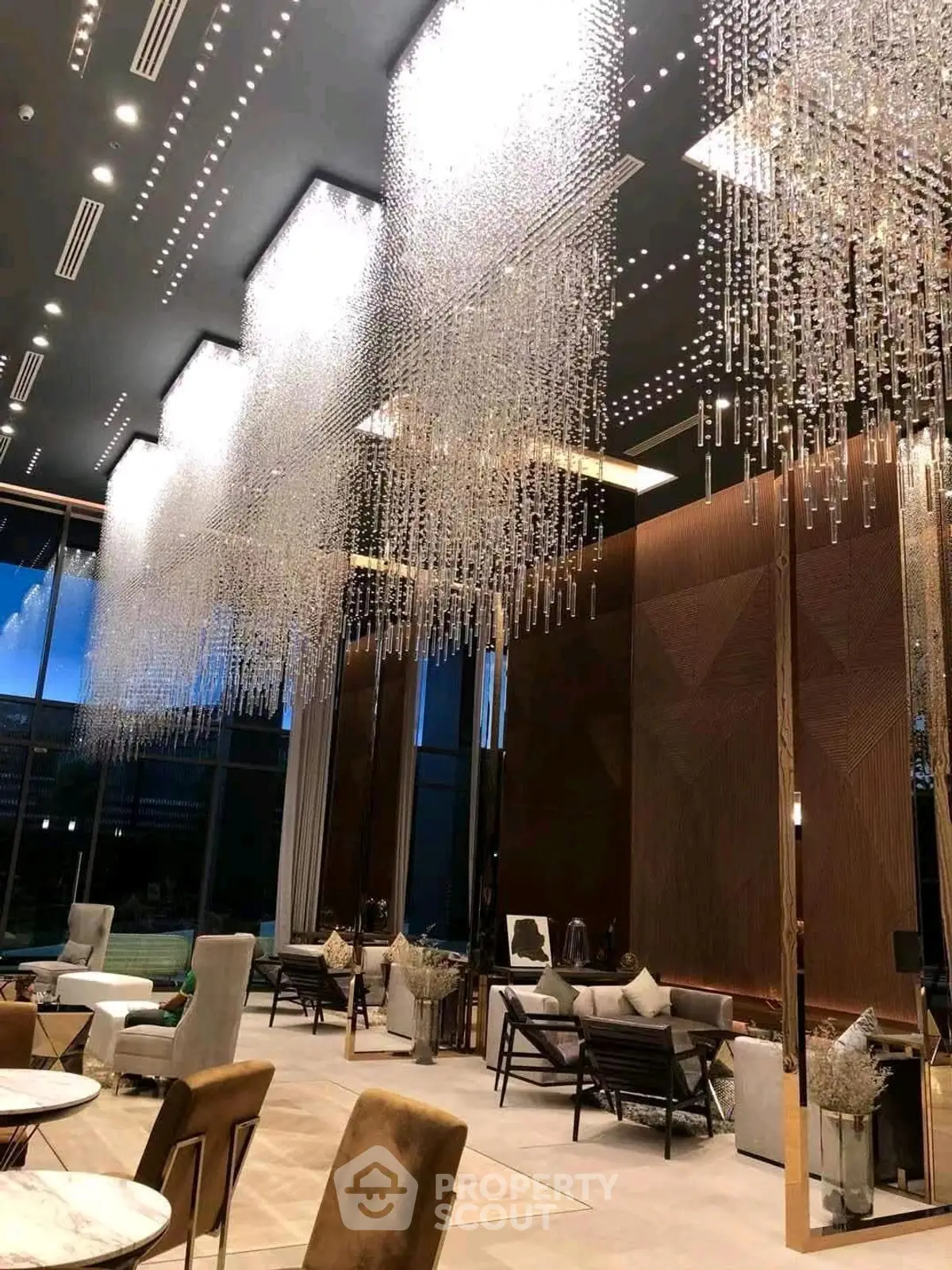 Luxurious modern living room with stunning chandeliers and elegant decor