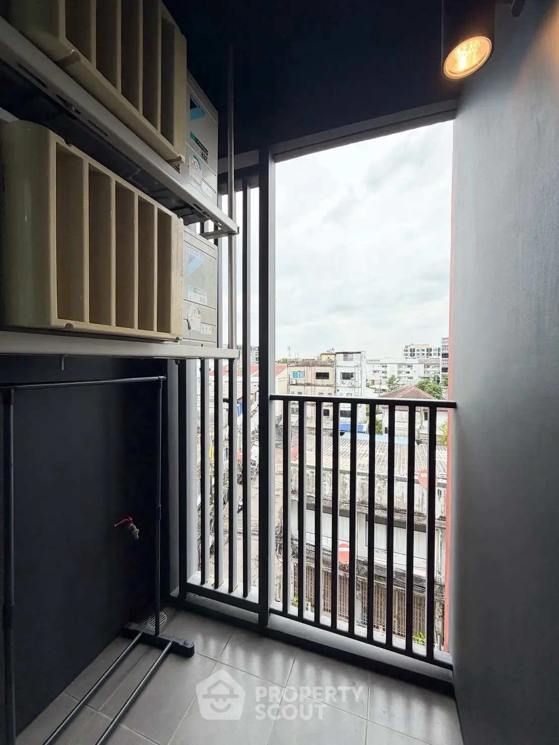 Modern balcony with city view and sleek railing design