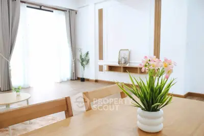 Bright and airy living room with modern decor and wooden accents