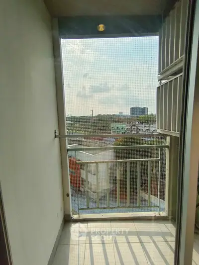 Charming balcony with city view, perfect for relaxation and enjoying the skyline.