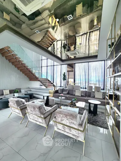 Luxurious modern living room with elegant decor and stunning staircase