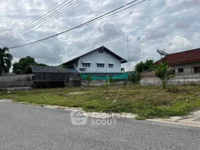 Charming suburban house with spacious yard and lush greenery, perfect for family living.