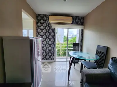 Cozy living room with modern decor and balcony view