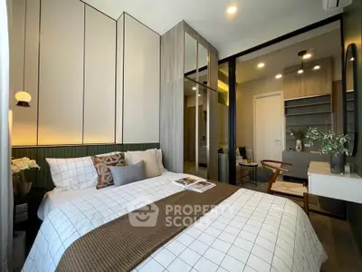 Modern bedroom with stylish decor and cozy ambiance, featuring a comfortable bed and elegant furnishings.