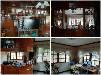 Charming wooden interior with cozy living and study areas, featuring classic decor and natural light.