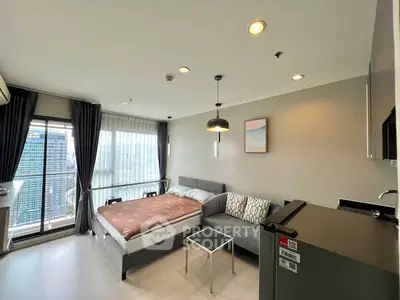 Modern studio apartment with city view and stylish interior design