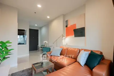 Modern living room with stylish leather sofa and contemporary decor