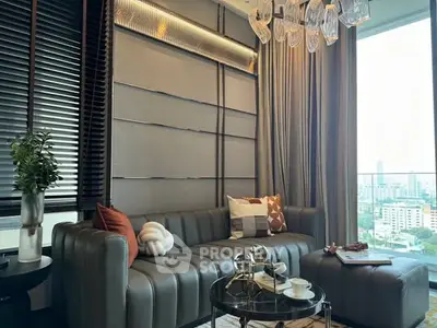 Luxurious living room with modern decor and stunning city view from balcony.