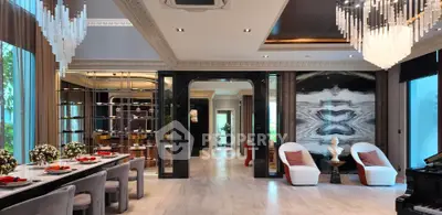 Luxurious modern living room with elegant chandeliers and stylish decor