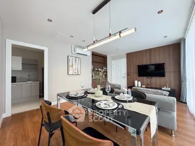 Modern dining and living room with elegant decor and open layout