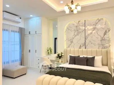 Luxurious bedroom with elegant decor and modern furnishings