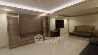 Luxurious bedroom with elegant lighting and modern furnishings