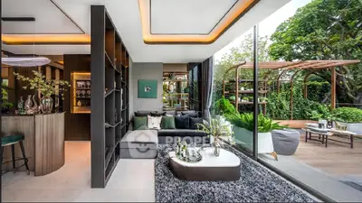 Luxurious modern living room with open layout and lush garden view