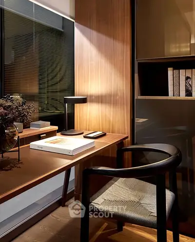 Elegant study room with modern desk, stylish chair, and ambient lighting for a cozy work environment.