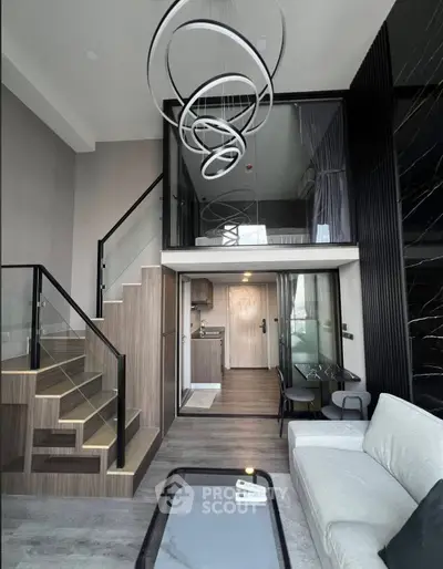 Modern duplex apartment with stylish living room and open kitchen layout