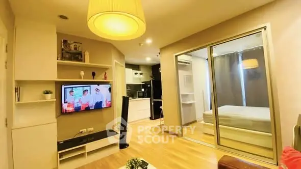 Modern living room with open layout and cozy bedroom view