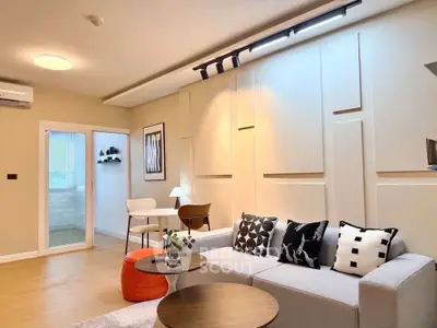 Modern living room with stylish decor and cozy seating area