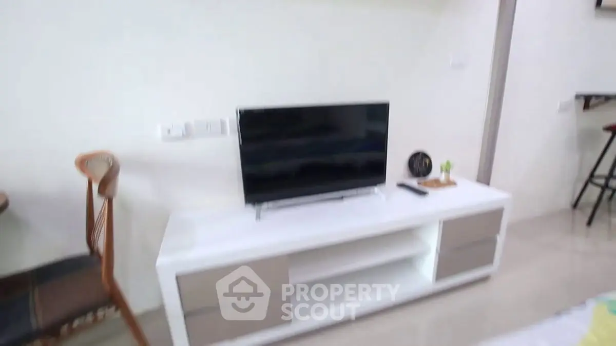 Modern living room with sleek TV stand and stylish decor