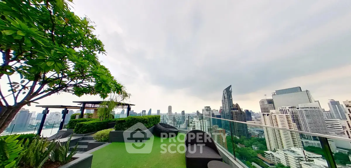 Stunning rooftop garden with panoramic city skyline views and modern outdoor seating.