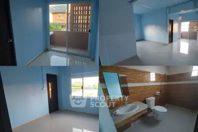 Spacious apartment with modern bathroom and bright interiors, featuring a balcony with a view.