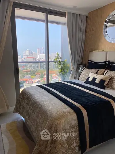Luxurious bedroom with stunning city view and elegant decor