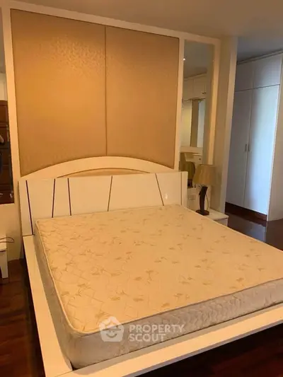 Spacious bedroom with modern design and ample storage space