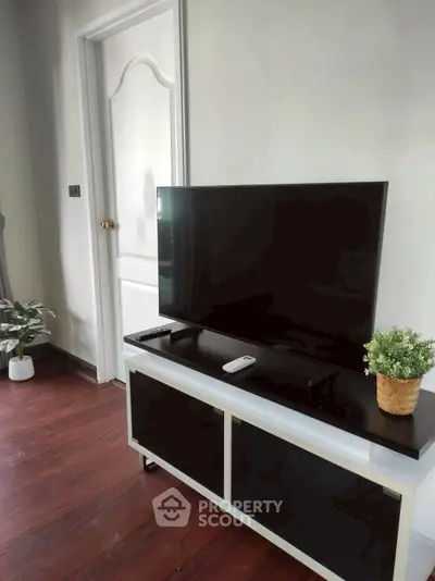 Modern living room with sleek TV stand and stylish decor