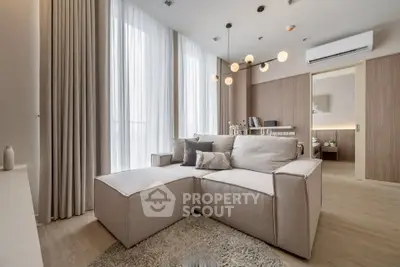 Modern living room with stylish decor and natural light