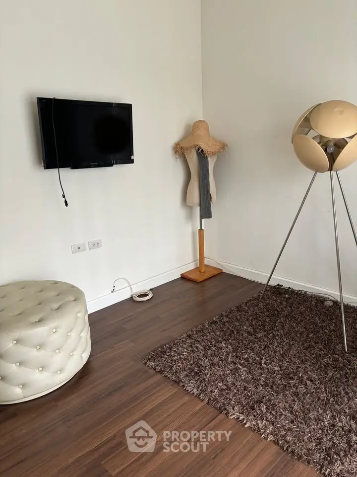 Chic modern living room with stylish decor and wooden flooring