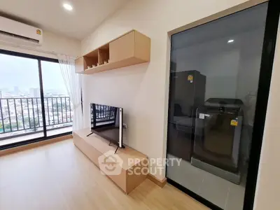 Modern living room with balcony view and sleek storage solutions