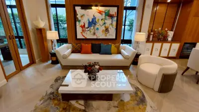 Luxurious living room with modern art and elegant furniture