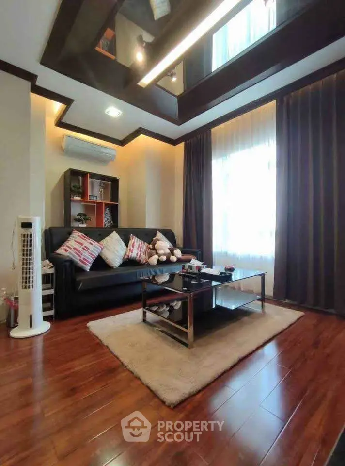 Elegant living room with modern decor and cozy seating area