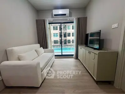 Modern living room with balcony view in a stylish apartment