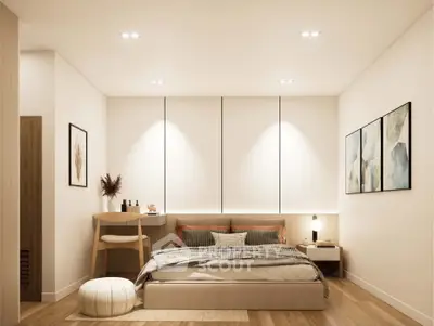 Modern bedroom with stylish decor and cozy lighting