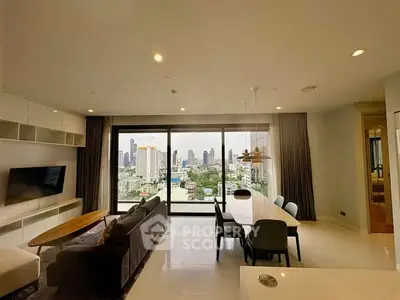 Spacious living room with stunning city view and modern furnishings